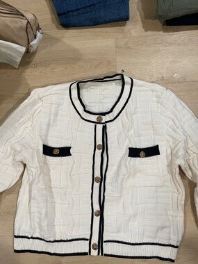 Classic Cream Knit Cardigan with Black Trim